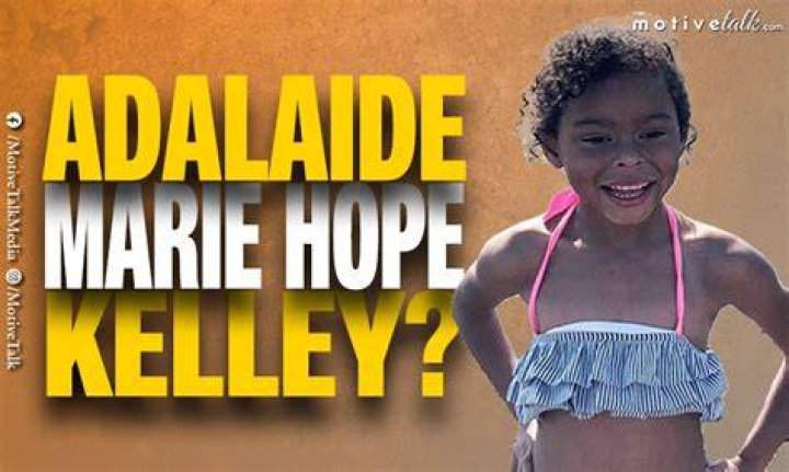 Adalaide Marie Hope Kelley caressing her pet dog.