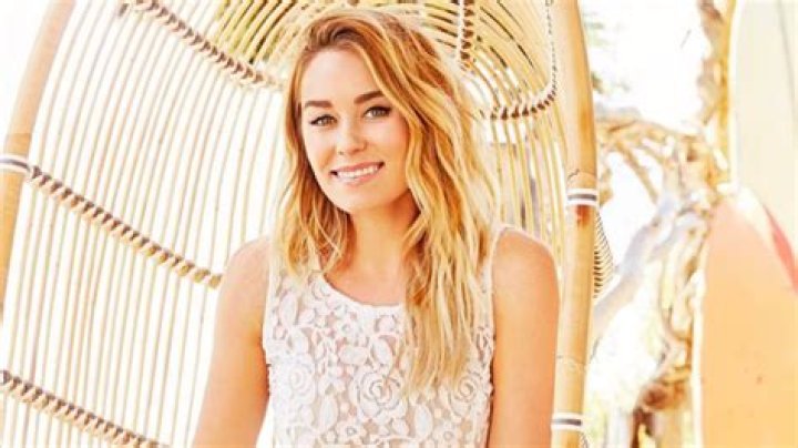 Lauren Conrad standing in front of her Beverly Hills Penthouse.